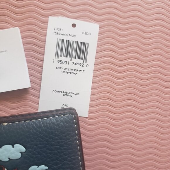 Coach x Peanuts Snap Wallet with Snoopy Ski Motif NWT - Picture 2 of 15